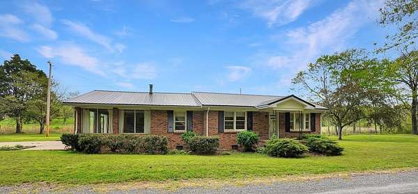 3.77 Acres of Land with Home for Sale in Indian Mound, Tennessee