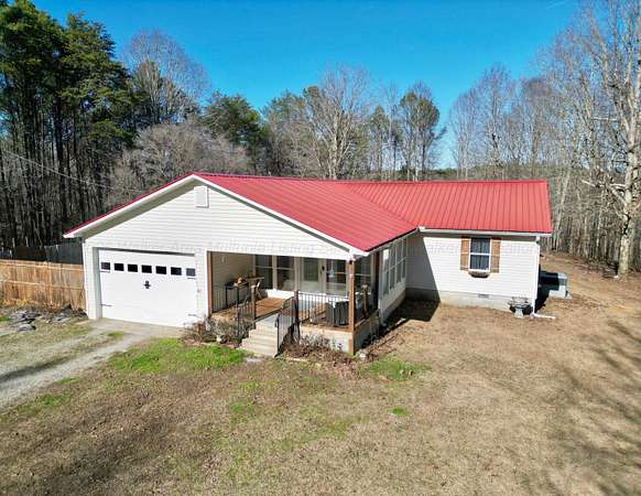 15.2 Acres of Land with Home for Sale in Haleyville, Alabama