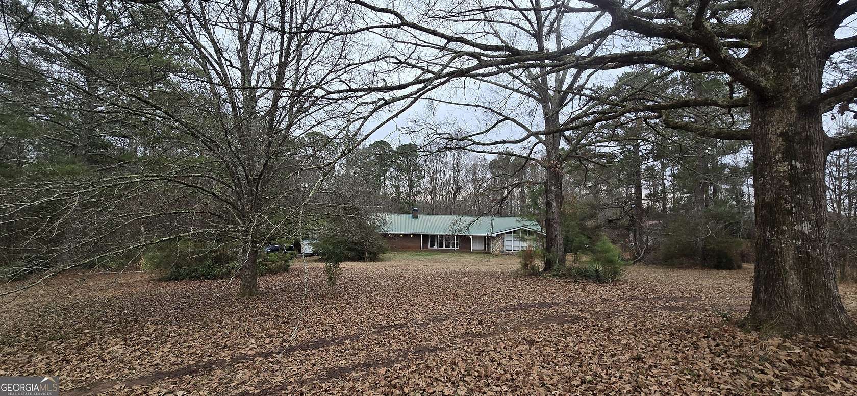 7.66 Acres of Land with Home for Sale in Conyers, Georgia