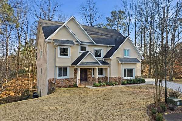 1.5 Acres of Residential Land with Home for Sale in Suwanee, Georgia