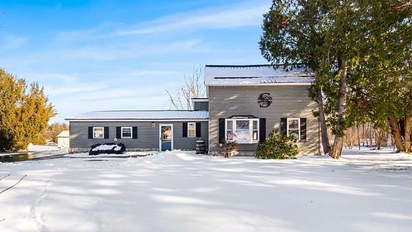 2.9 Acres of Residential Land with Home for Sale in Comins, Michigan