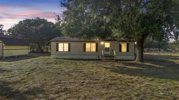 6.6 Acres of Residential Land with Home for Sale in Webster, Florida