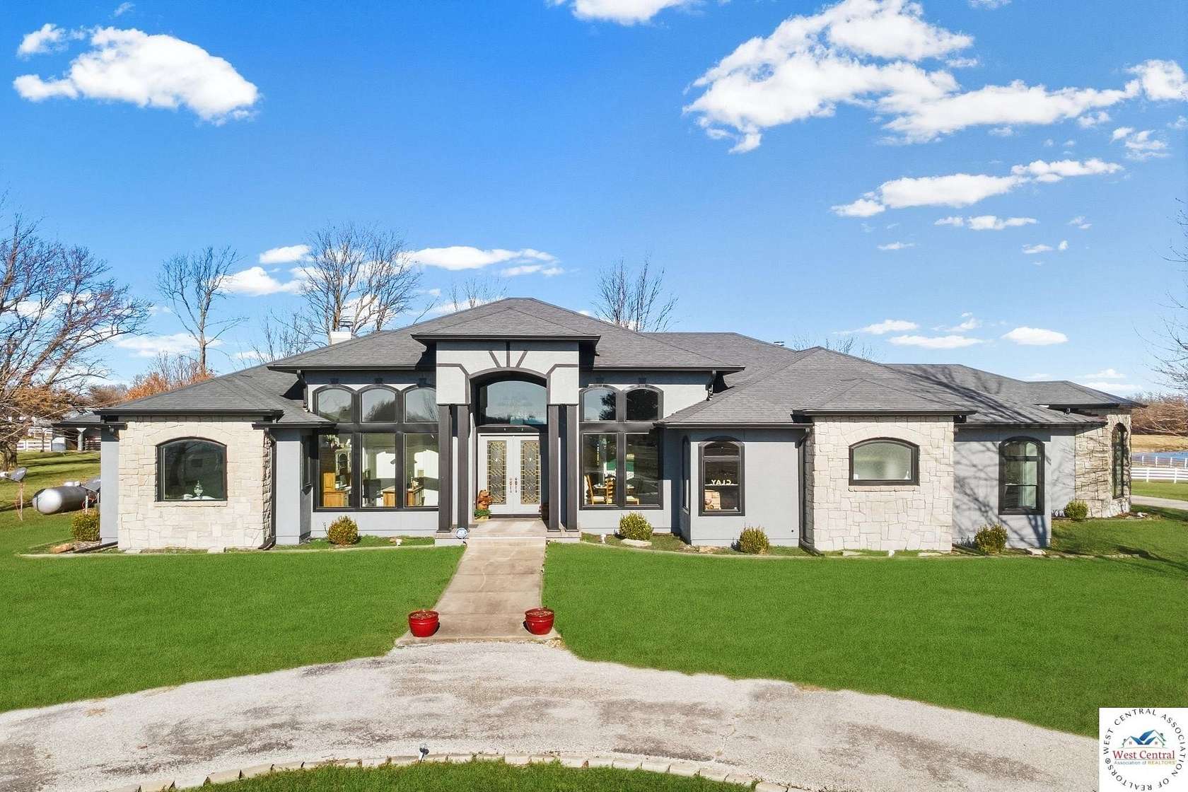 80 Acres of Agricultural Land with Home for Sale in Clinton, Missouri