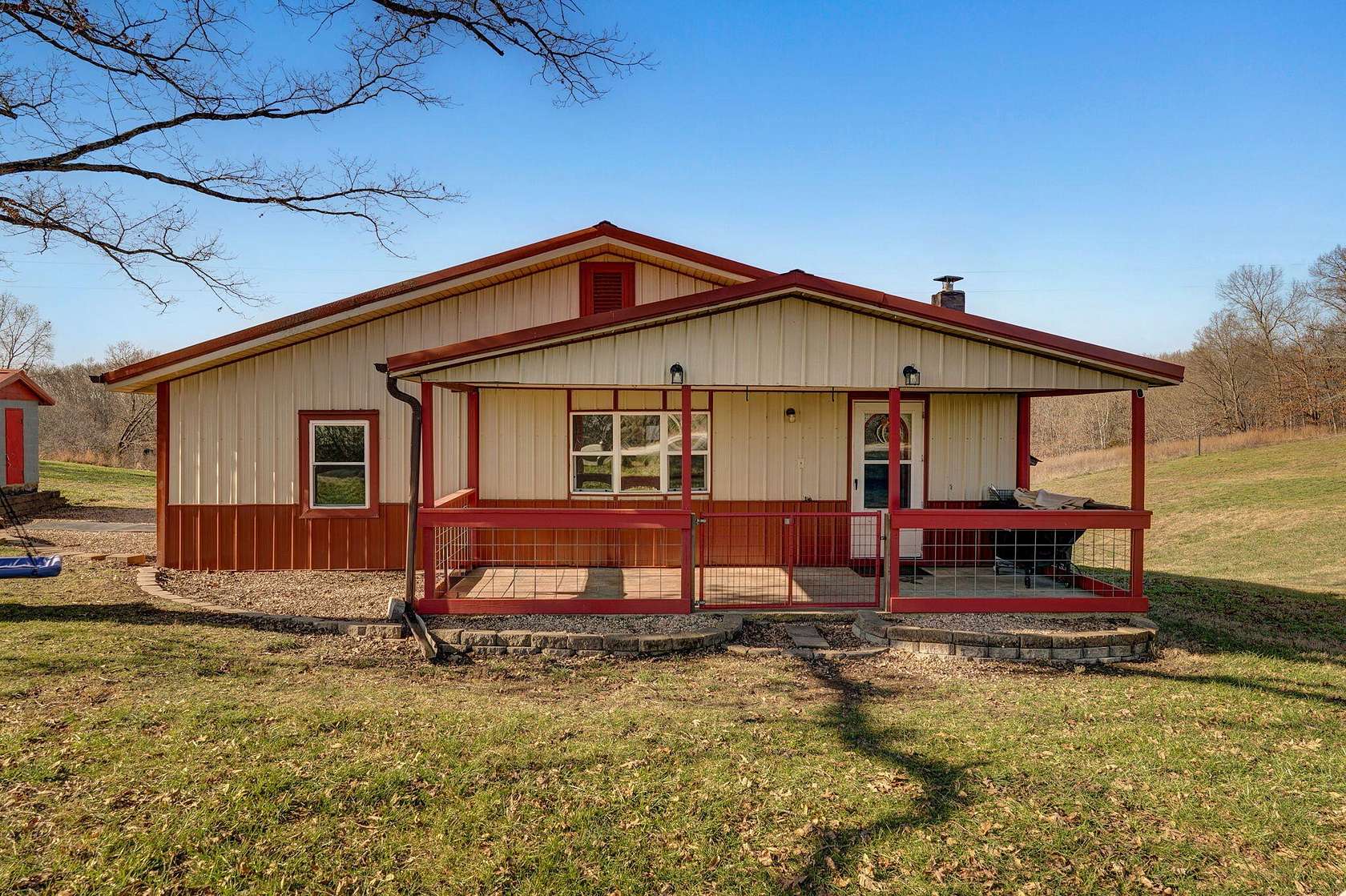 14.3 Acres of Land with Home for Sale in Crane, Missouri