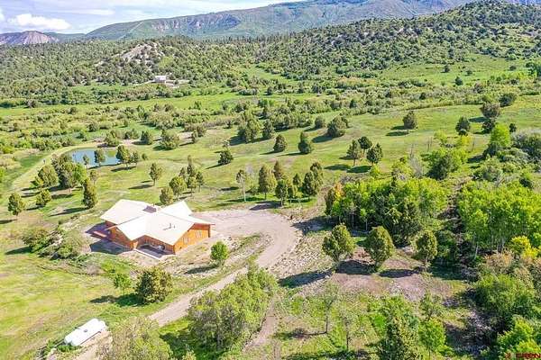 81.4 Acres of Recreational Land with Home for Sale in Dolores, Colorado