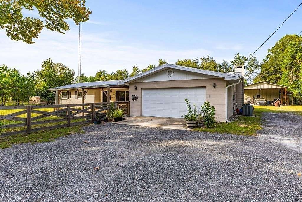 2.5 Acres of Land with Home for Sale in Chiefland, Florida