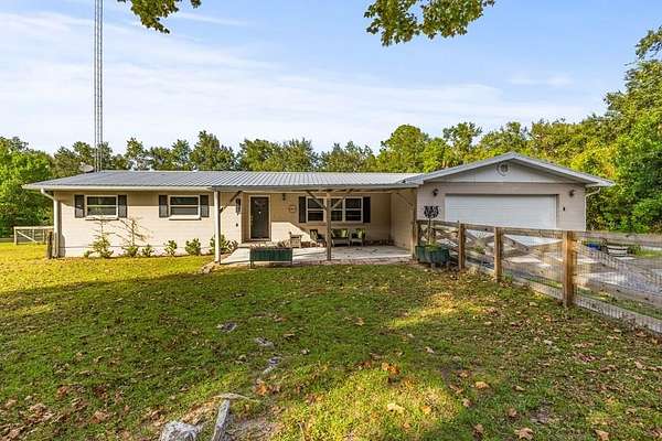 2.5 Acres of Residential Land with Home for Sale in Chiefland, Florida