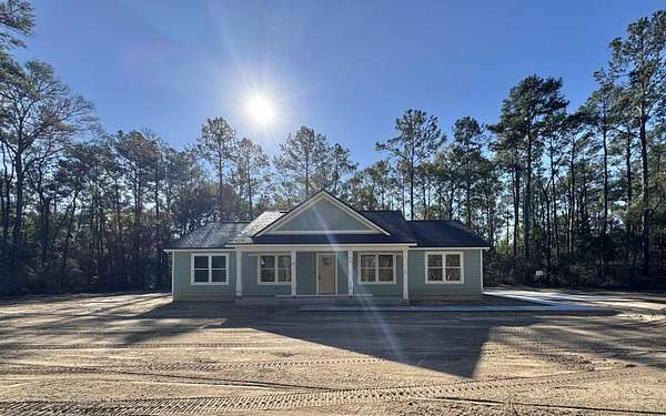 7.5 Acres of Residential Land with Home for Sale in Crawfordville, Florida