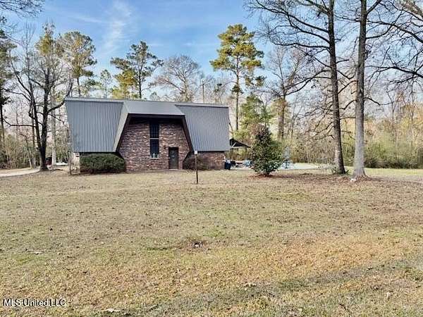 5 Acres of Residential Land with Home for Sale in Summit, Mississippi