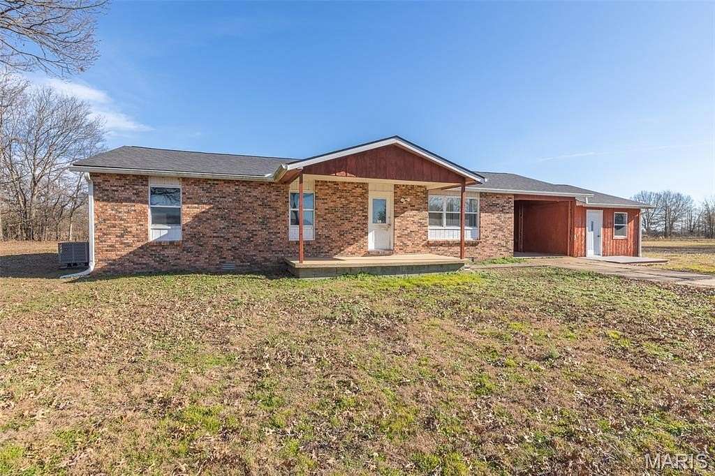 22.8 Acres of Land with Home for Sale in Poplar Bluff, Missouri