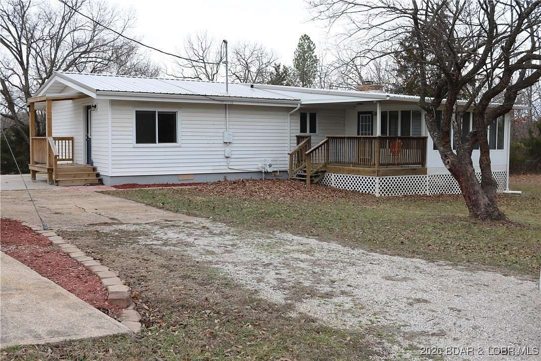 1.5 Acres of Residential Land with Home for Sale in Gravois Mills, Missouri