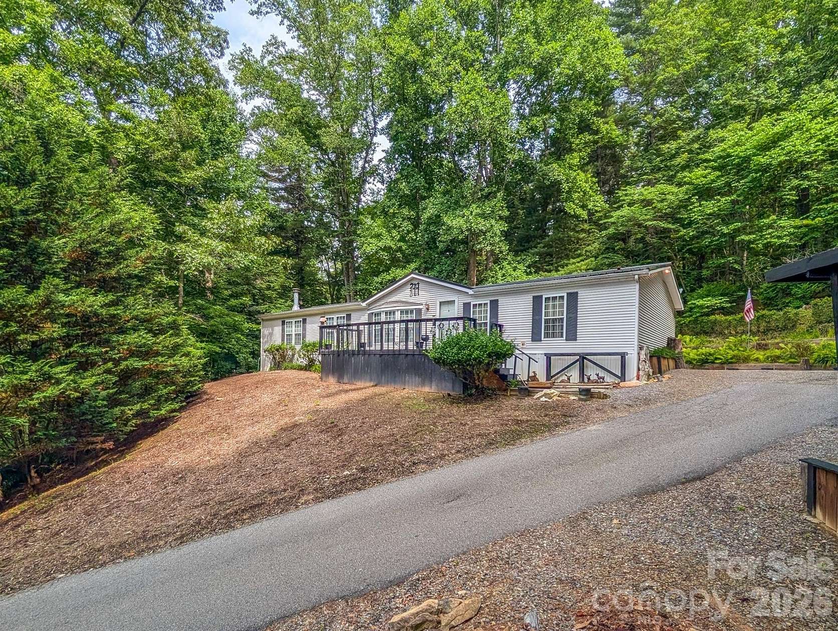 2.46 Acres of Land with Home for Sale in Burnsville, North Carolina