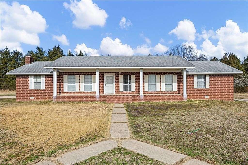 13.7 Acres of Land with Home for Sale in Branch, Arkansas