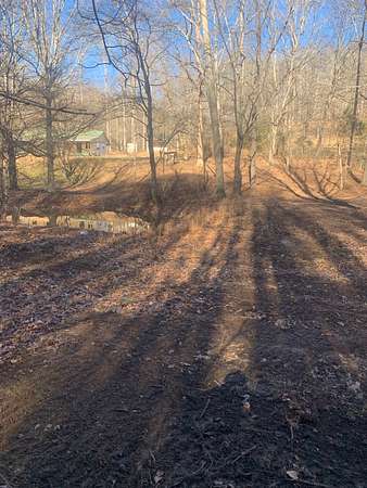 16.6 Acres of Land with Home for Sale in Centerville, Tennessee