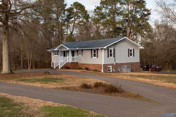 10.6 Acres of Land with Home for Sale in Albertville, Alabama