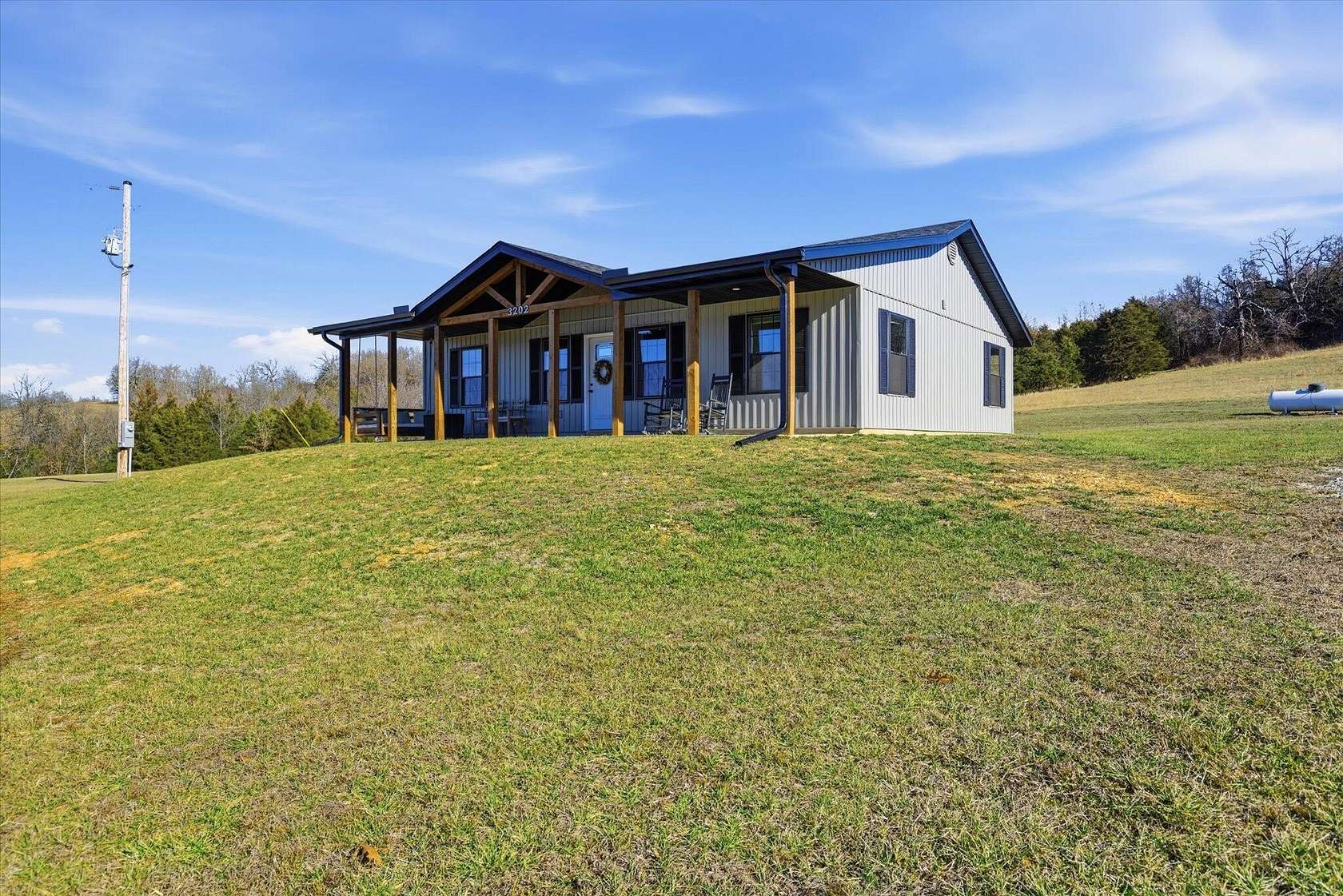 7.8 Acres of Residential Land with Home for Sale in Mansfield, Missouri