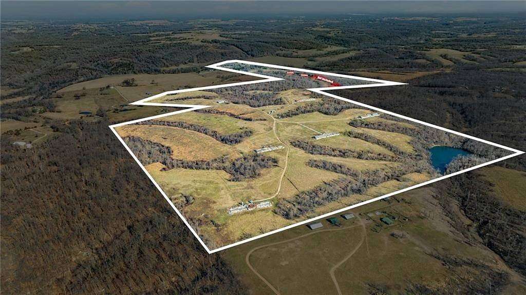 286 Acres of Recreational Land & Farm for Sale in Gravette, Arkansas