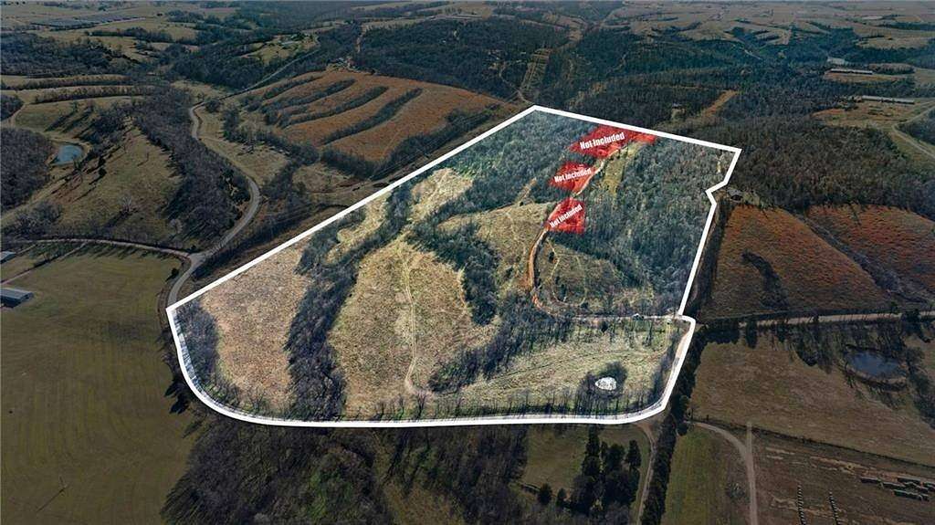 74 Acres of Recreational Land for Sale in Gravette, Arkansas