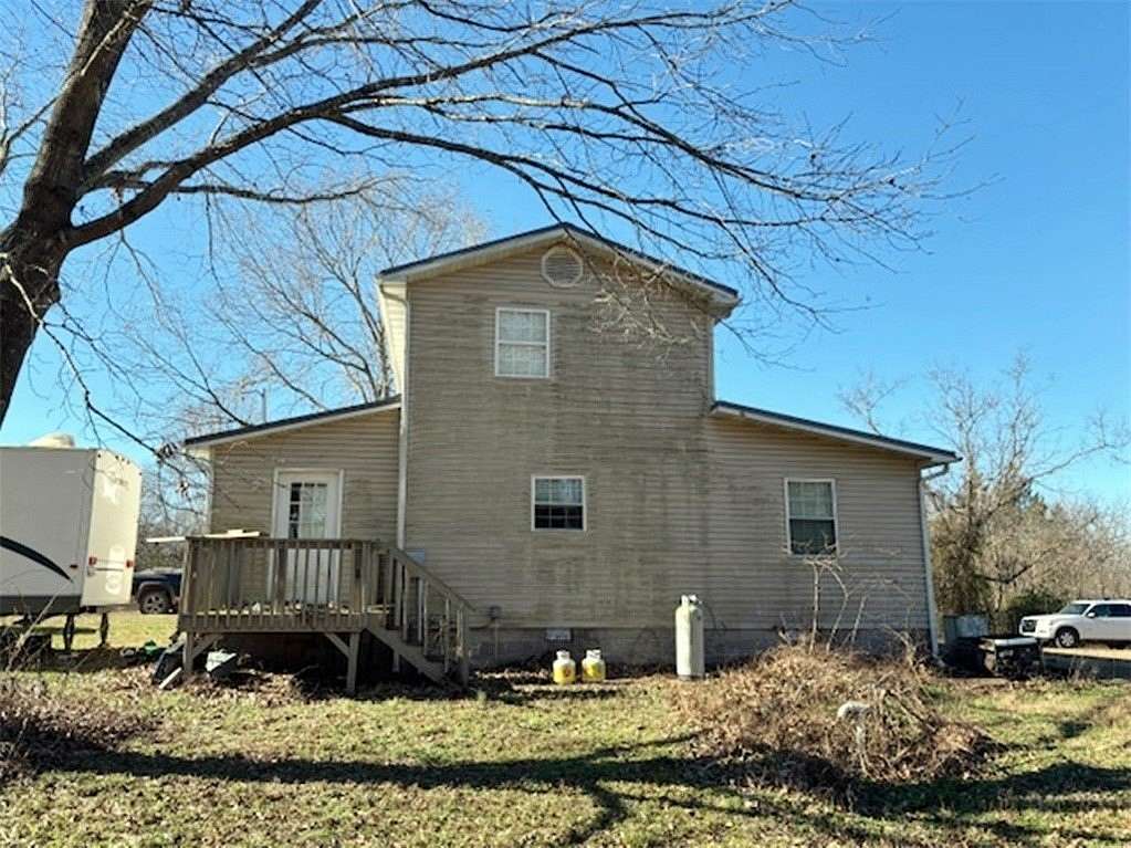 3.5 Acres of Land with Home for Sale in Harrison, Arkansas