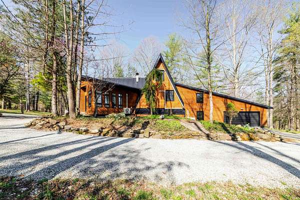 14.3 Acres of Recreational Land with Home for Sale in Bedford, Indiana