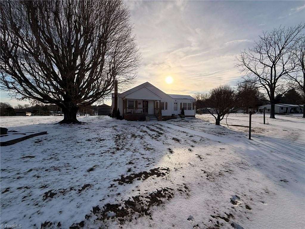 10.5 Acres of Land with Home for Sale in Hamptonville, North Carolina