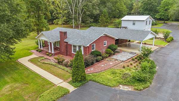 14 Acres of Land with Home for Sale in Michie, Tennessee