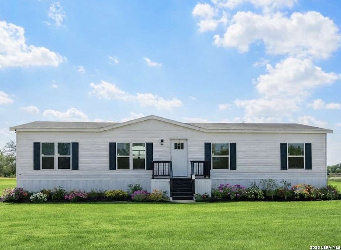 5 Acres of Land with Home for Sale in Lytle, Texas