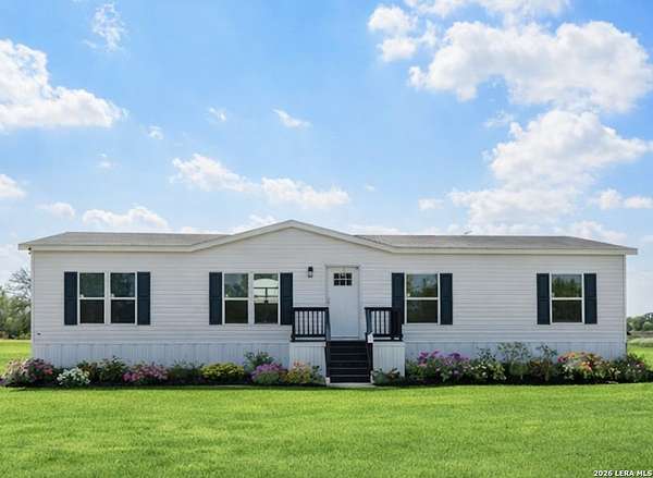 5 Acres of Land with Home for Sale in Lytle, Texas