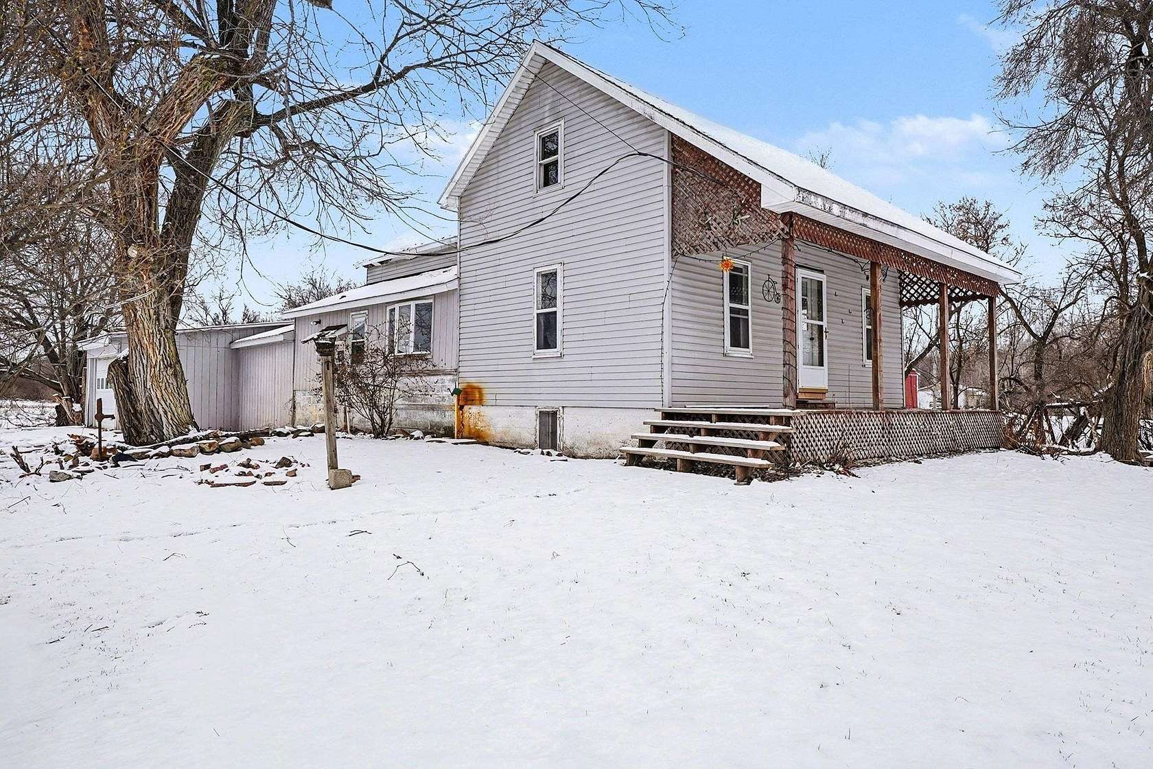 5 Acres of Land with Home for Sale in Beaverton, Michigan