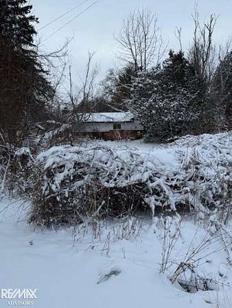 1.63 Acres of Residential Land with Home for Sale in Chesterfield, Michigan