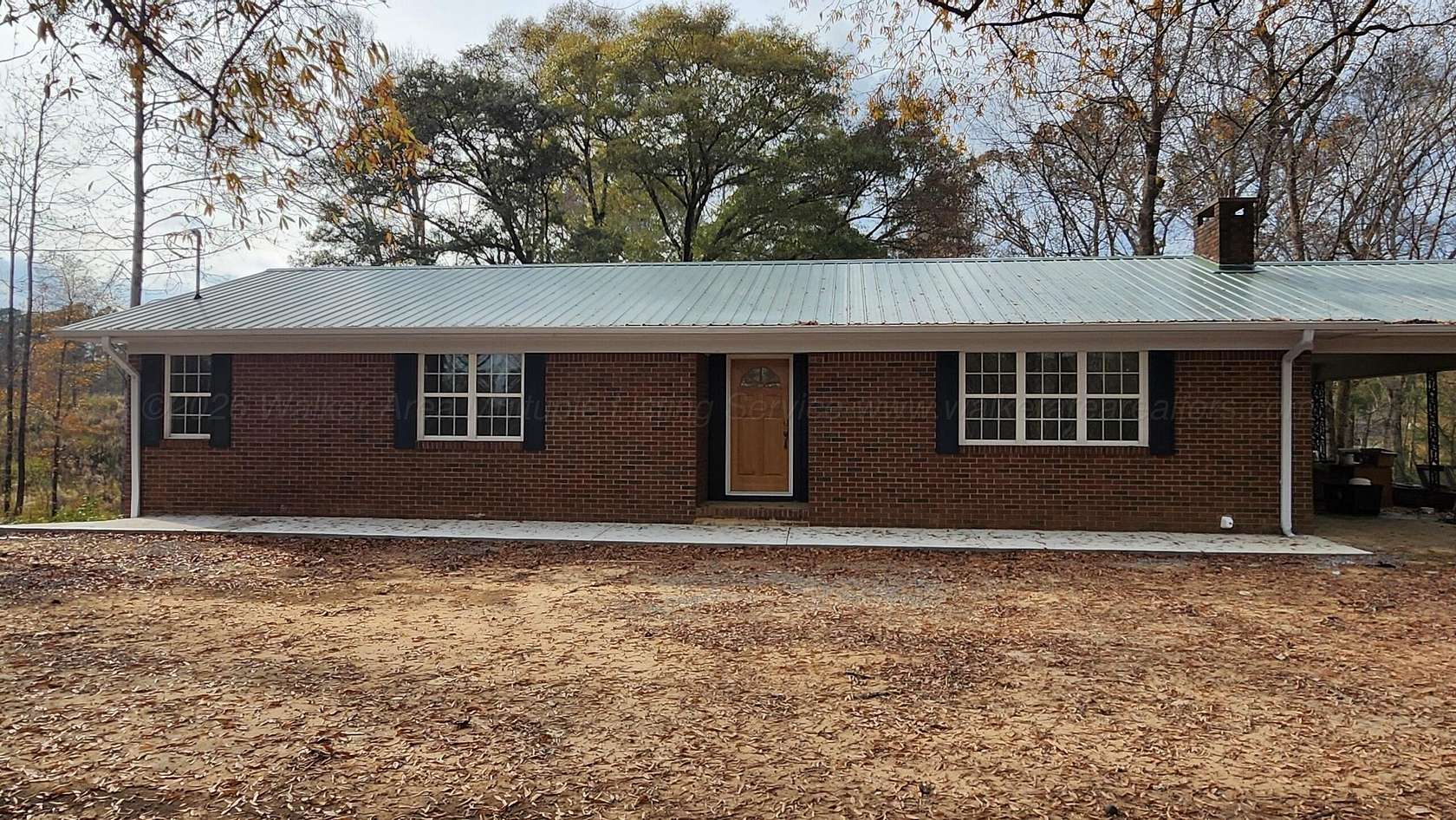 1.5 Acres of Land with Home for Sale in Jasper, Alabama