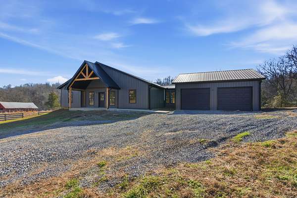 53 Acres of Land with Home for Sale in Cottontown, Tennessee