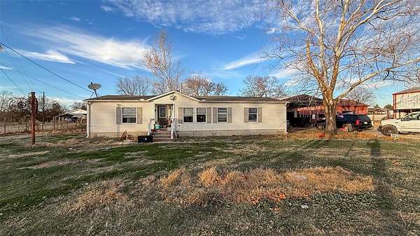 7.47 Acres of Residential Land with Home for Sale in Denison, Texas