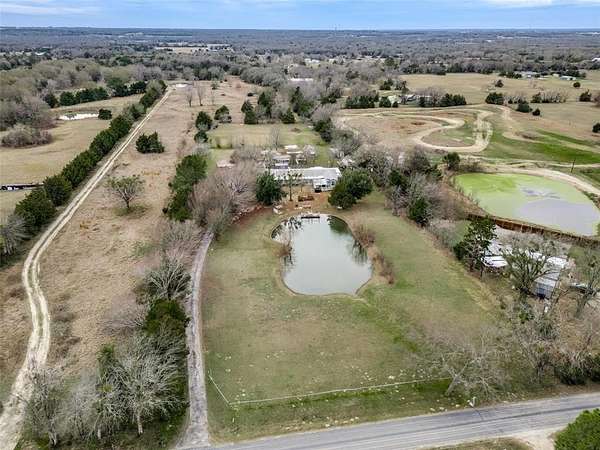 4 Acres of Residential Land with Home for Sale in Terrell, Texas