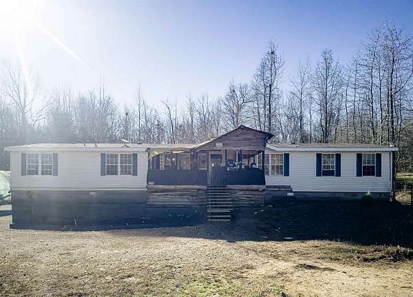 5 Acres of Land with Home for Sale in Mountain View, Arkansas
