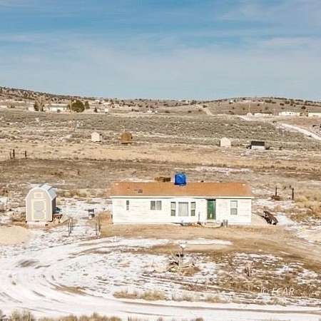 2 Acres of Residential Land with Home for Sale in Spring Creek, Nevada