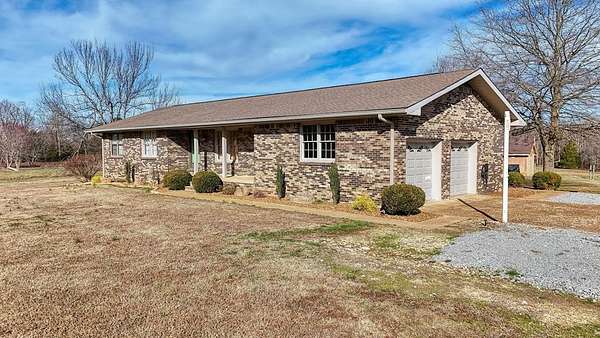 1.74 Acres of Land with Home for Sale in Big Sandy, Tennessee