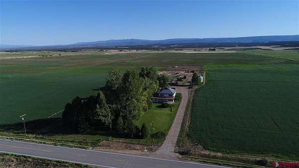 230 Acres of Land with Home for Sale in Redvale, Colorado