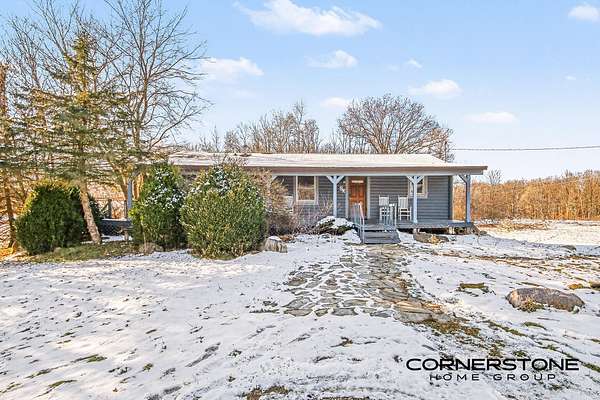 7.76 Acres of Residential Land with Home for Sale in Cedar Springs, Michigan