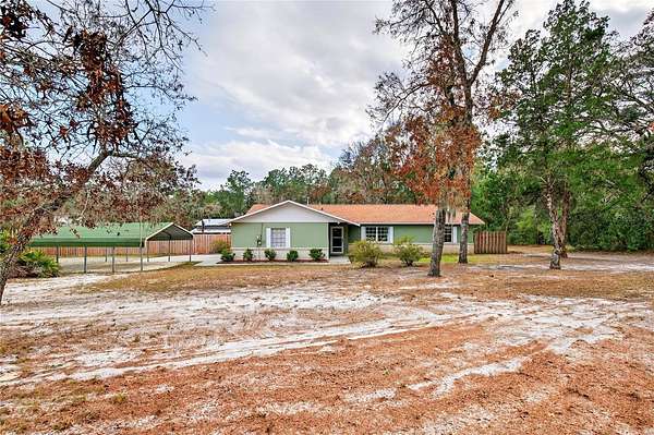 5 Acres of Residential Land with Home for Sale in Dunnellon, Florida