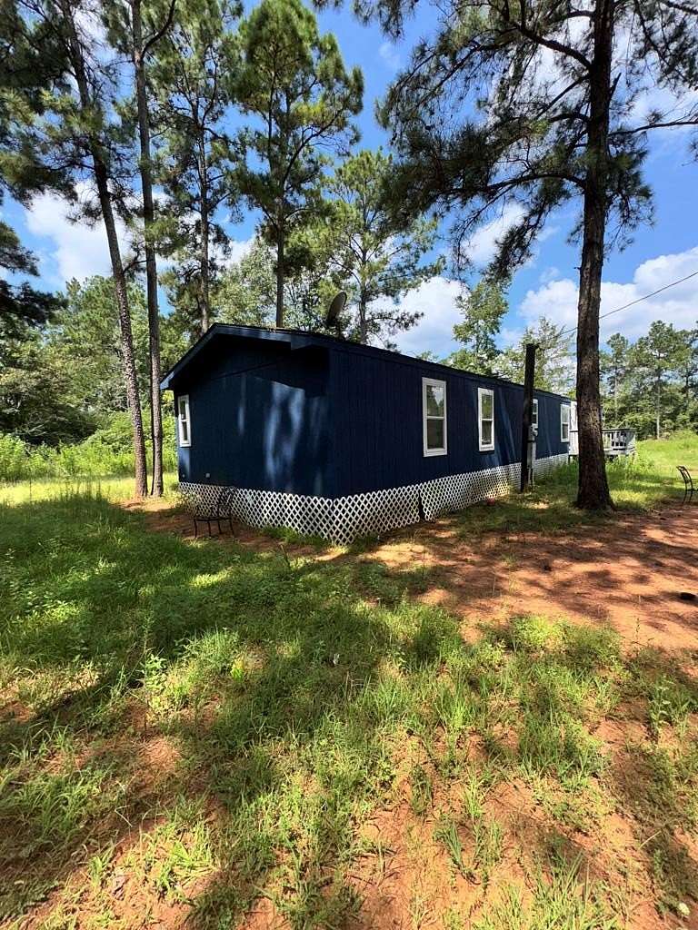 2 Acres of Residential Land with Home for Sale in Mount Enterprise, Texas