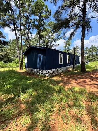 2 Acres of Land with Home for Sale in Mount Enterprise, Texas