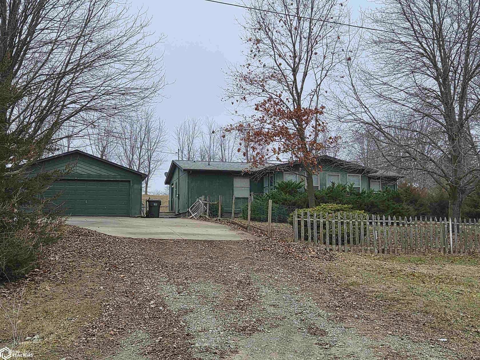 2.3 Acres of Residential Land with Home for Sale in Oskaloosa, Iowa