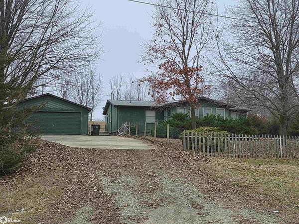 2.3 Acres of Residential Land with Home for Sale in Oskaloosa, Iowa