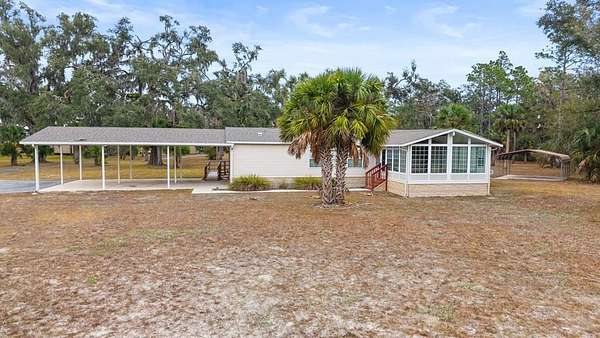 8.82 Acres of Land with Home for Sale in Perry, Florida