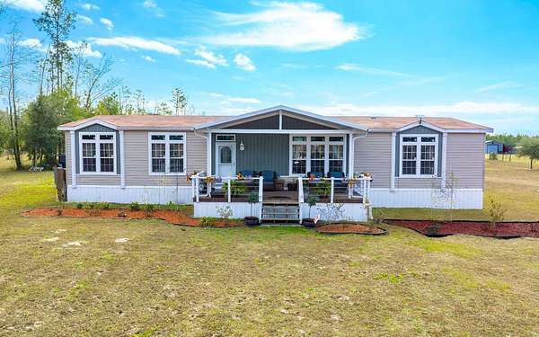 5 Acres of Residential Land with Home for Sale in Lake City, Florida