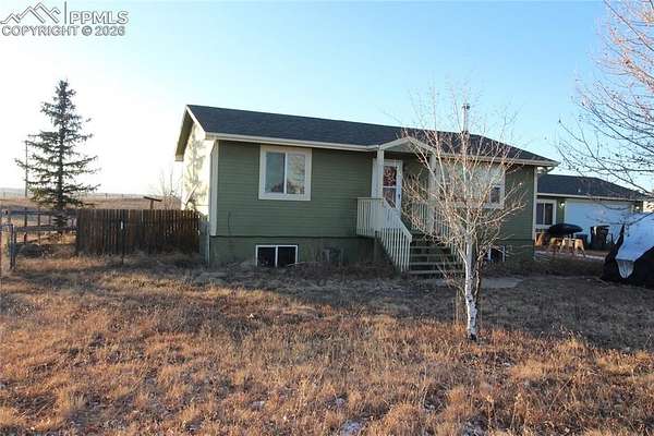 2.5 Acres of Residential Land with Home for Sale in Peyton, Colorado