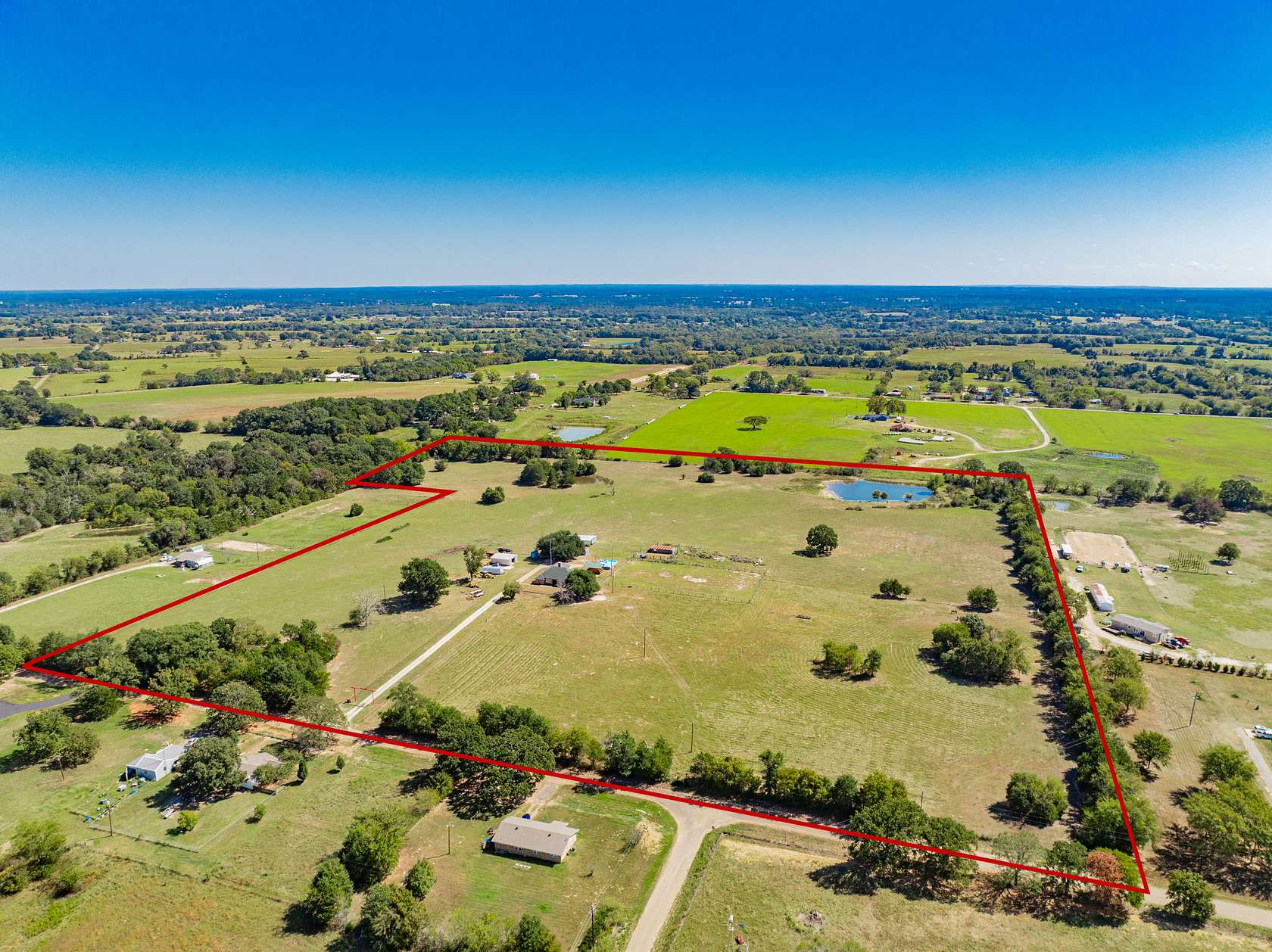 34.9 Acres of Agricultural Land with Home for Sale in Fruitvale, Texas