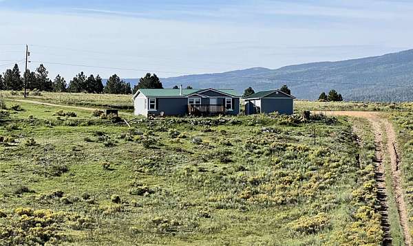 2 Acres of Residential Land with Home for Sale in Angel Fire, New Mexico