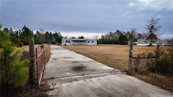 2.57 Acres of Residential Land with Home for Sale in Waynesville, Georgia